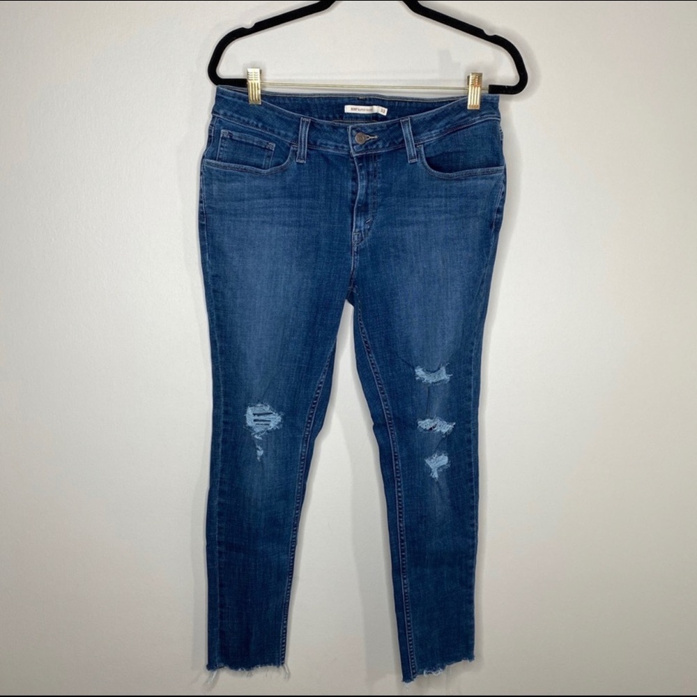 Levi’s 535 Distressed Skinny Jeans
